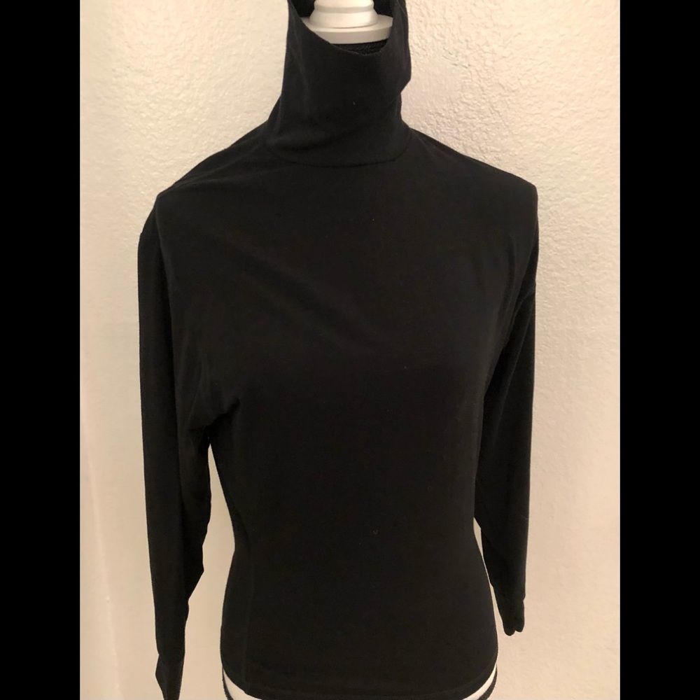 Hot Chillys warm but light base turtleneck. Worn alone w/ jeans or ski pants.